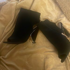 Size 11 heels! Brand new, never worn. Very unique design